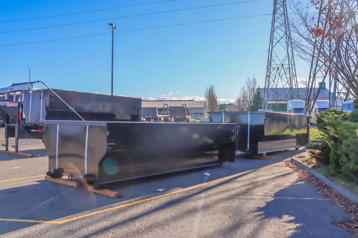 Roll-off dumpster ready for waste disposal at job site for 6 Yard Dumpster Rental in Salem